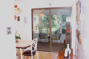 Strathmore Gate Stony Brook - Kitchen with sliding doors to jalousie porch