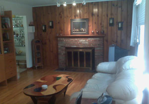 Centerport - Huntington Beach Cape - Living Room with Fireplace & Wood Floors