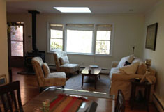 Huntington House Rental - Skylight in Living Room with Wood Burning Stove - RENTED