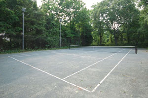 Lloyd Harbor Wooded Retreat with Country Club Setting - Lighted Har-Tru Tennis Court - SOLD